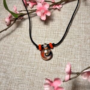 VINTAGE Black Corded Necklace with Round Grange and Blue Swirl Glass Pendant